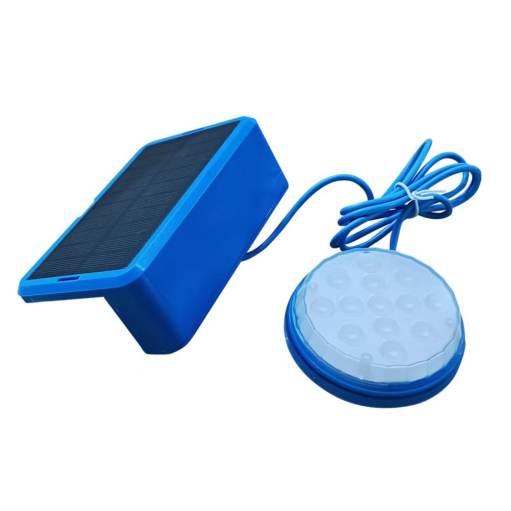 Blue solar panel and round LED underwater swimming pool light